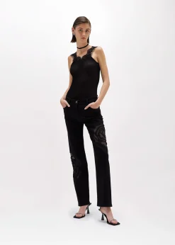 BLACK DENIM JEANS WITH CUT-OUT ROSE DESIGN