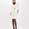 FITTED DRESS WITH BRANDED BELT
