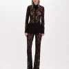 Flared pants in stretch lace