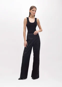 FLARED PANTS WITH CUT-OUT ROSE DESIGN