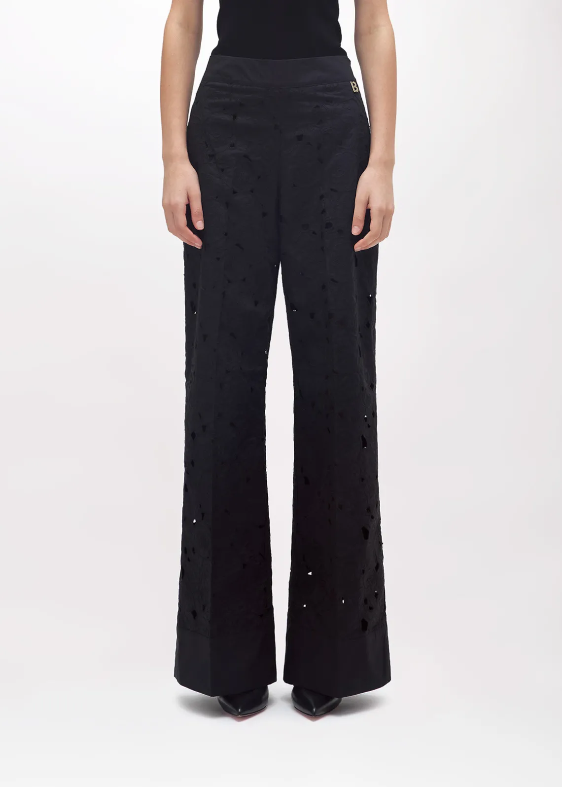 FLARED PANTS WITH CUT-OUT ROSE DESIGN