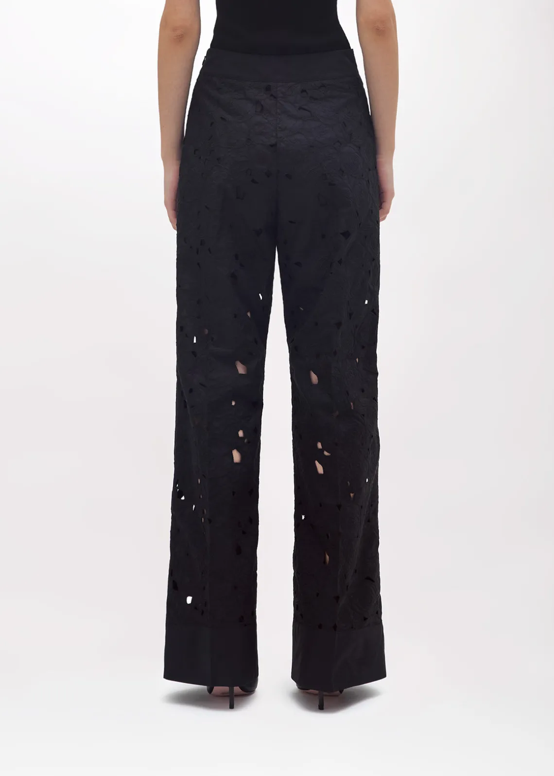 FLARED PANTS WITH CUT-OUT ROSE DESIGN