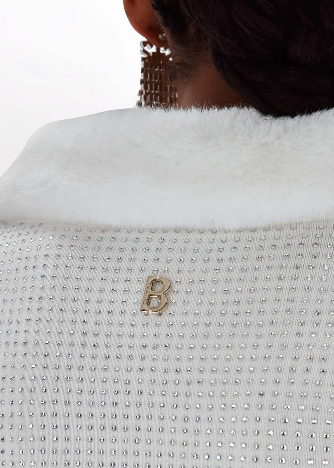 Full rhinestone viscose yarn cardigan with faux fur detailing.