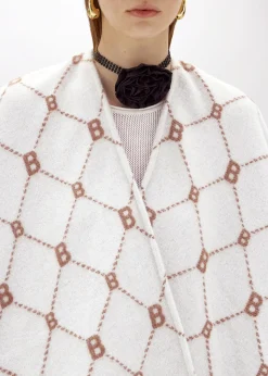 PONCHO WITH ALL-OVER LOGO
